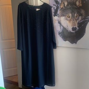 Leandra size  16 dress navy blue in colour beads seven across chest